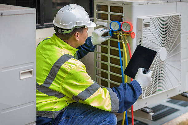 Professional Hvac technician working in Bennington, IN